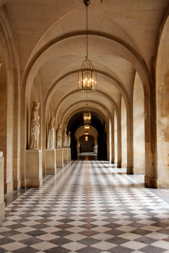 There were many beautiful hallways and scores of chandeliers. This was originally a palace built Louis XIV near the town of Versailles, southwest of Paris. It was built around a chateau belonging to Louis XIII, which was transformed by additions in the grand French classical style.